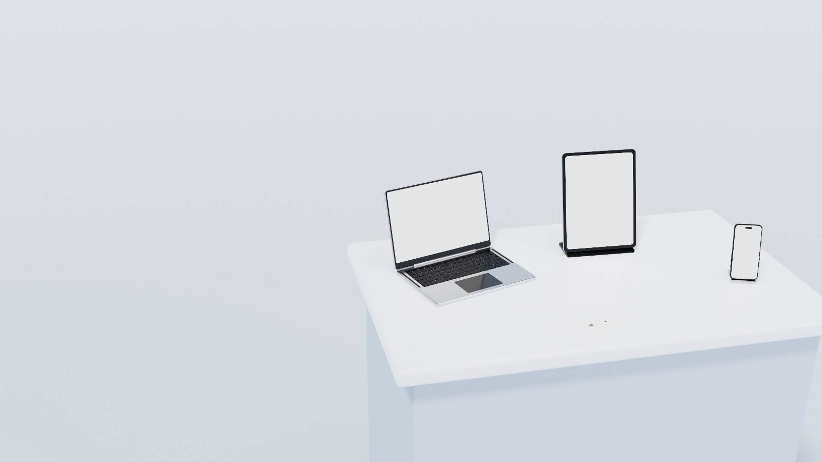 Station 01, Channels, close up: a laptop with an online checkout on its screen, a tablet with an invoice, a phone ready to take a tap and a card on the counter.