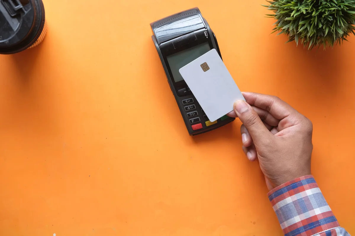 A contactless card payment on a terminal.